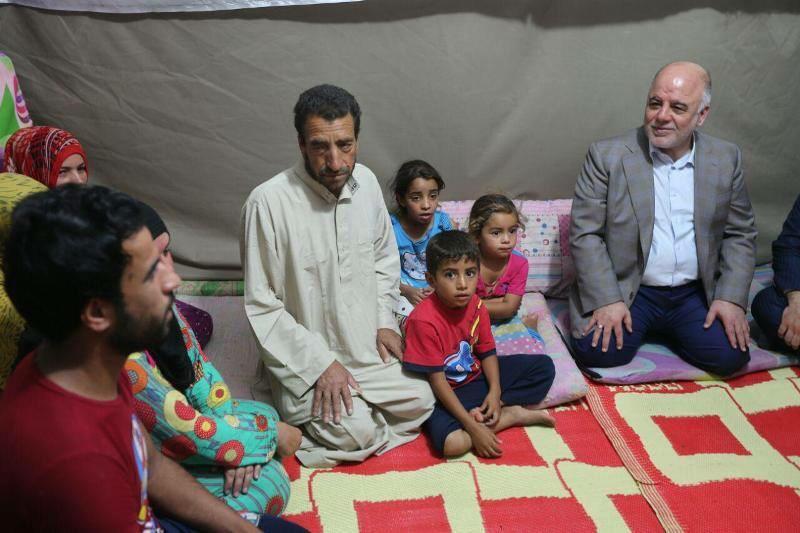 HaiderAlAbadi's tweet photo. PM Al-Abadi met IDPs at a camp in Baghdad and stressed government's commitment to ensuring their safe return home http://t.co/O0nUqozaKB