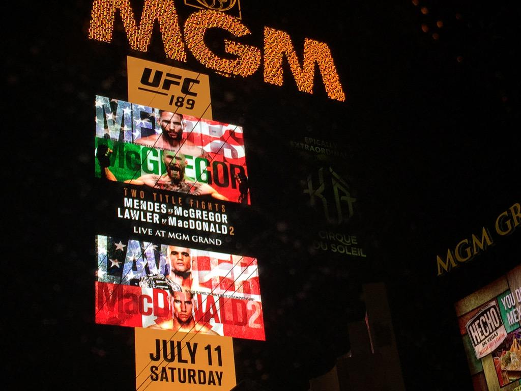 ufc's tweet photo. #UFC189 lights up the Las Vegas Strip. 
We're 1 week away! 👊🏽👊🏽 http://t.co/0U2ZuFM7e5