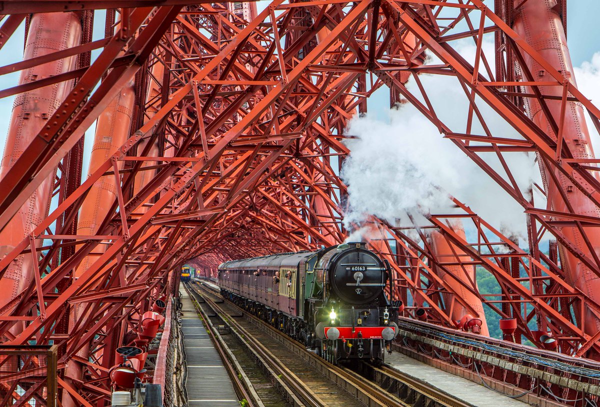 Stunning photos by <a href="/devlinphoto/">Peter Devlin</a> of Tornado loco crossing the #ForthBridge, Scotland’s newest #WorldHeritage Site