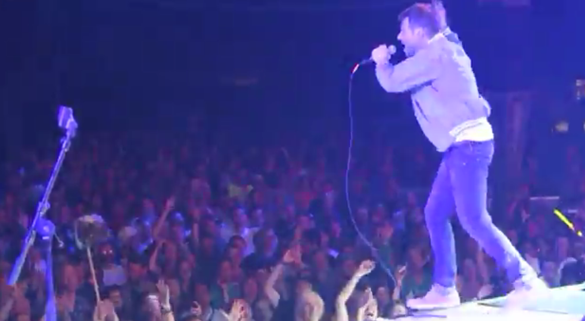 pitchfork's tweet photo. Watch @Damonalbarn cover @TheClash at Roskilde, then get carried off stage by security http://t.co/vhtE4wt82C http://t.co/oSmlayZoyx