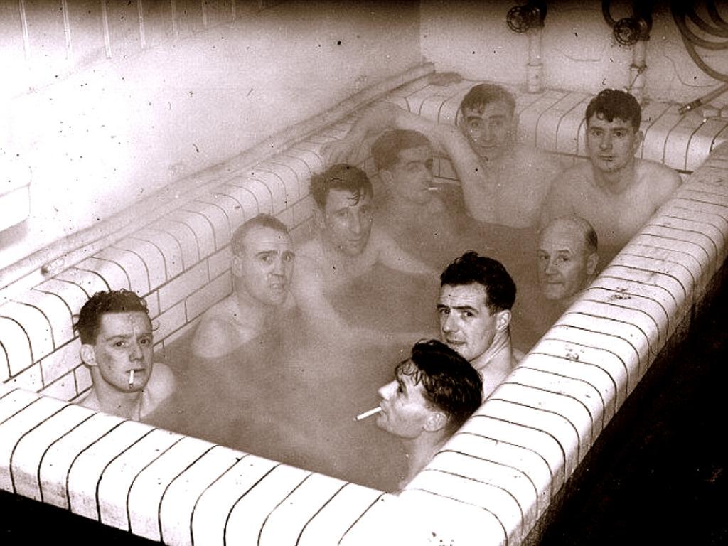 Ipswich Town players enjoy a bath and a cigarette after a fixture at Portman Road in 1939. #ITFC