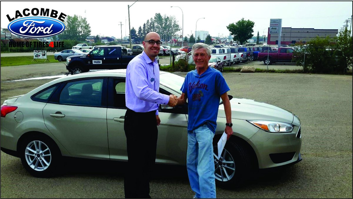<a href="/LacombeFord/">Lacombe Ford</a> Sales Rep, Blair Bartman with Don Snyder, owner of a new 2015 Ford Focus. #ford #customerexperience