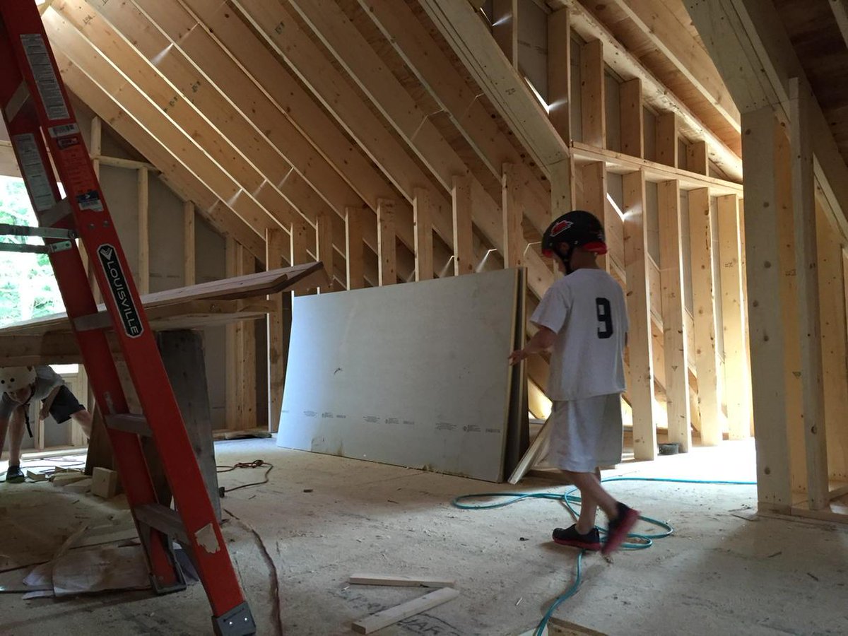 MarissaElinda's tweet photo. Third floor is getting framed out. Amos peruses Annabelle's room. | #squarehouse #roundtwo http://t.co/V6oNyjrS8e