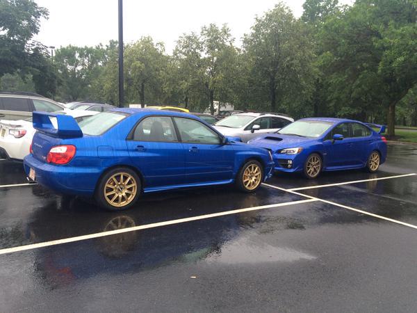 An '04 STI hanging out with a '15 Launch Edition STI, #ItsaSubieThing