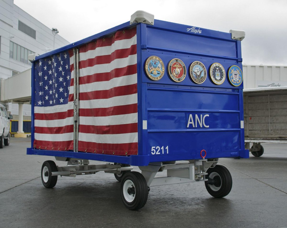 AlaskaAir's tweet photo. Alone on the airfield, one cart is reserved for heroes. Proud we can bring our Fallen Soldier Program to #Anchorage. http://t.co/HJ93LyCC71