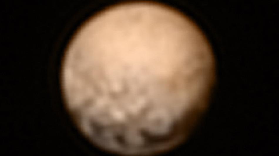 mashable's tweet image. NASA's newest photos of Pluto reveal a curiously reddish dwarf planet on.mash.to/1JKvcMB