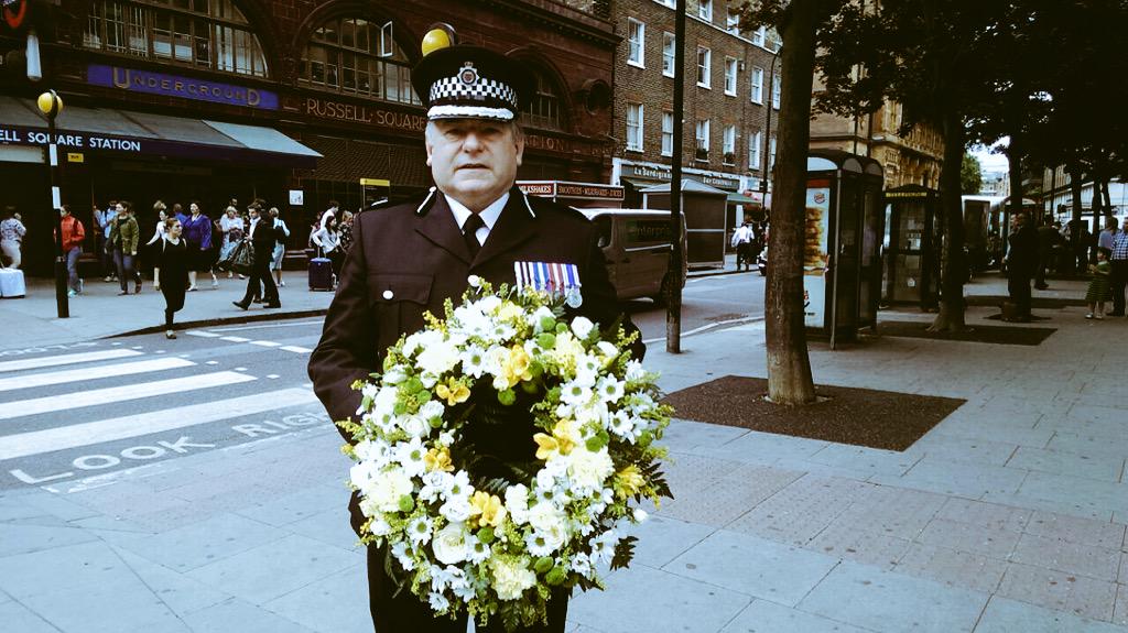 BTP's tweet photo. At Russell Square, we remember. #sevenseven http://t.co/eUxgXHDbXe