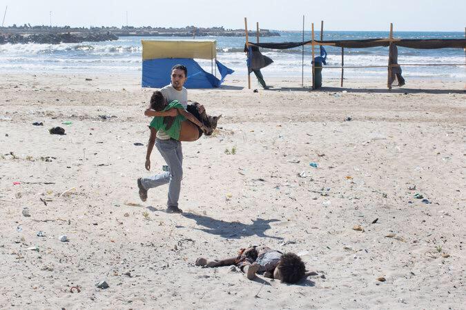 alauhali's tweet photo. It really hurts when you see Israelis having fun on the beach, while palestinian kids are killed on it!
#TelAvivLive http://t.co/wgavhiXXnQ