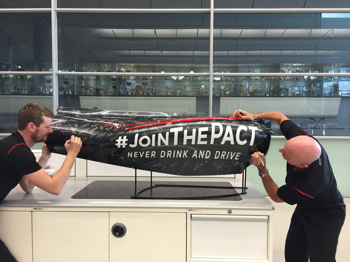 McLarenF1's tweet photo. #JoinThePact continues back at MTC as McLaren employees sign the sidepod &amp; commit to never drink &amp; drive. http://t.co/2Do5Eu1Zxr