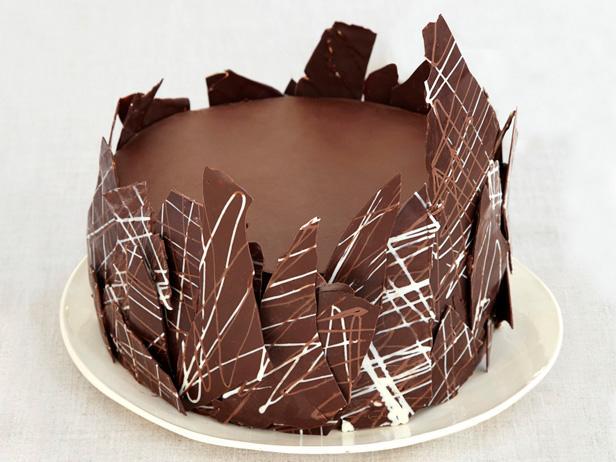 Learn how to make a four-layer chocolate cake from #CakeWars expert @RBICakes: foodtv.com/3awp8.