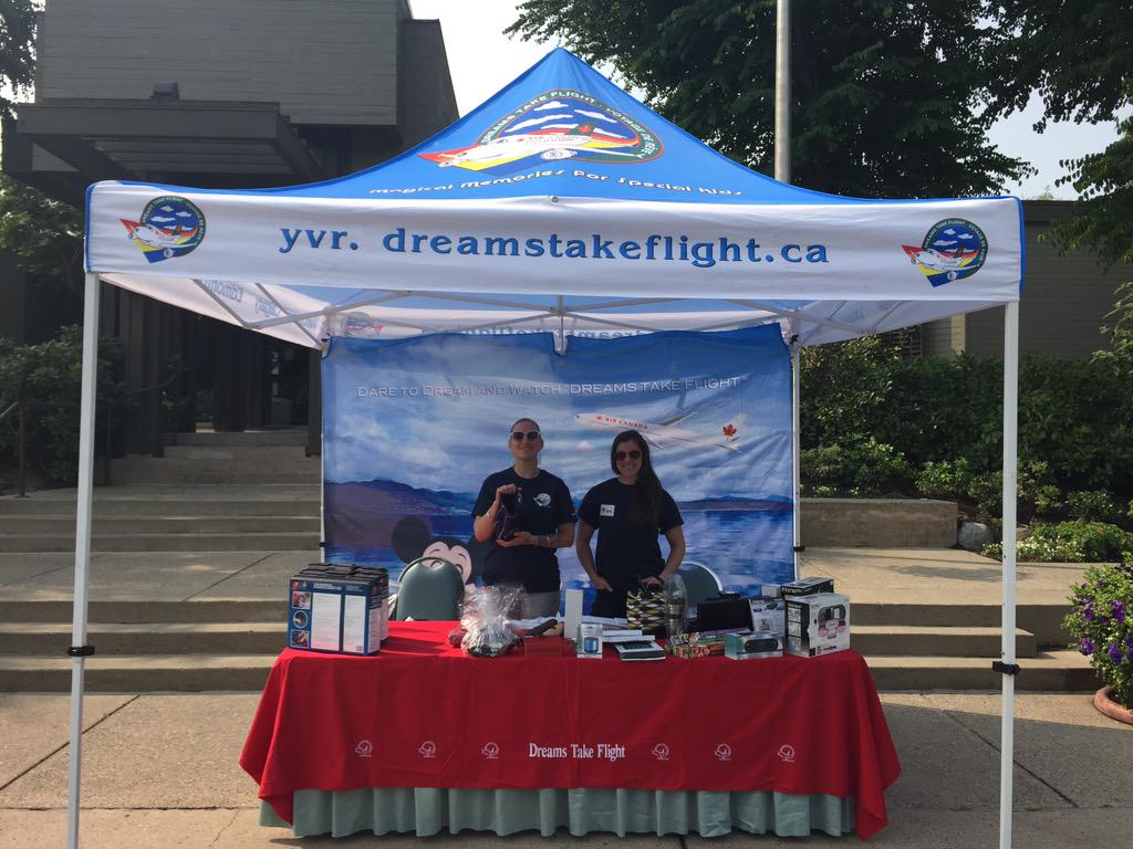 DreamsYVR's tweet photo. @TCFCanada volunteers helping at the Registration tent full of amazing door prizes! #golf4dreams http://t.co/7AlFxLU55V