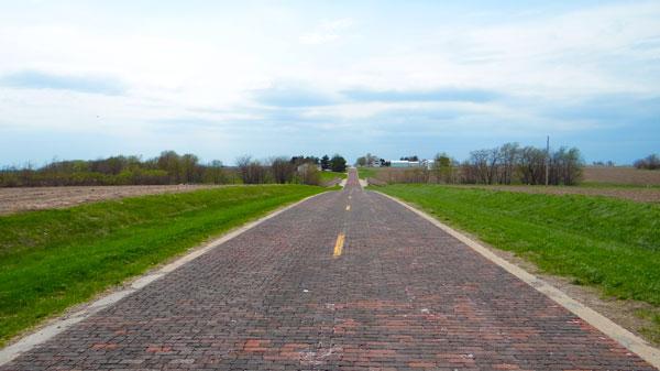 ILRoute66's tweet photo. See a portion of Route 66 brick road in Auburn, IL: http://t.co/WX020U2sZl http://t.co/PFAU0jbxS8