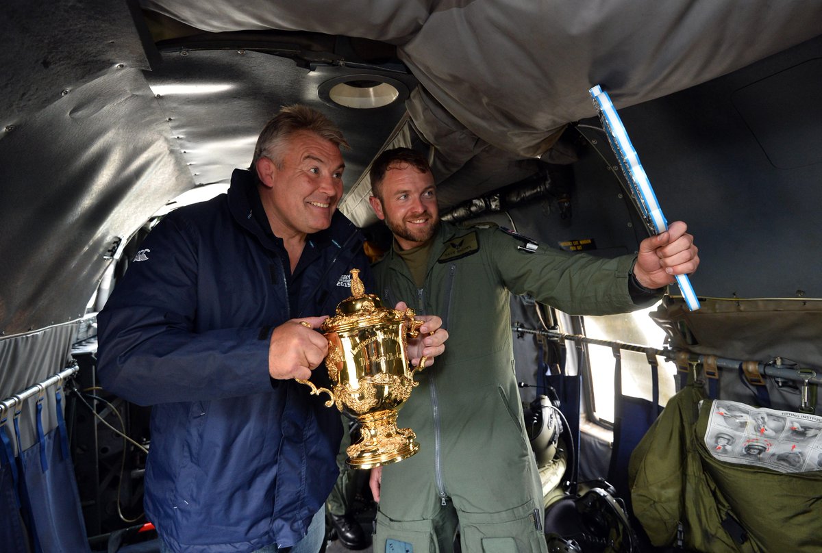 rugbyworldcup's tweet photo. Jason Leonard welcomes the RWC Trophy Tour to England &amp; escorts the Webb Ellis Cup to Perranporth Beach by helicopter http://t.co/JXgYOOWc1F