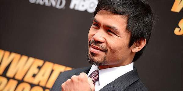 ELTIEMPO's tweet image. Pacquiao está preparado para la revancha con Mayweather en 2016 ow.ly/Pm2mX