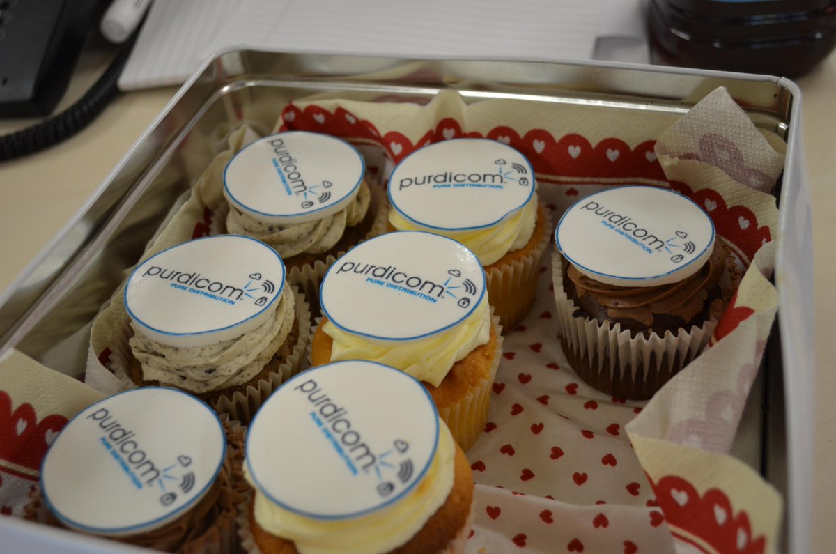 Purdicom's tweet image. We have our very own Purdicom cakes today! Courtesy of Lola's Home Bakery! Needless to say they didn't last long.