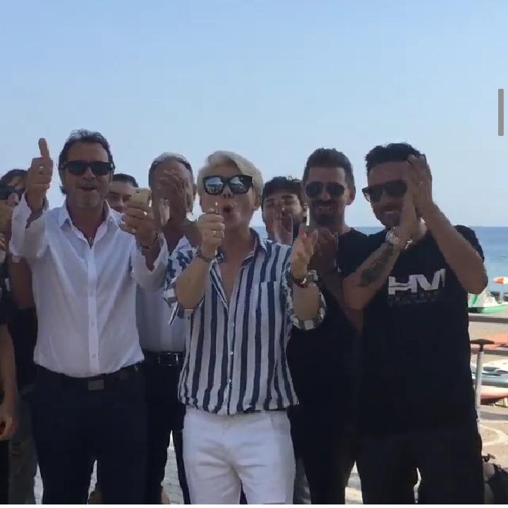 Awww... singing happy birthday Kim Heechul with friends while at Naples.     