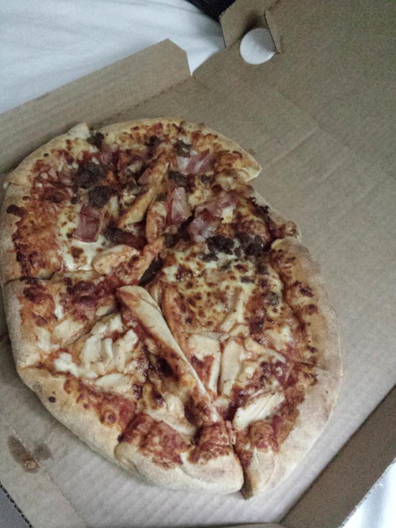 JamessP5's tweet photo. @Dominos_UK took 50 minutes to get here and then looks like this http://t.co/zZUeNXnp2y