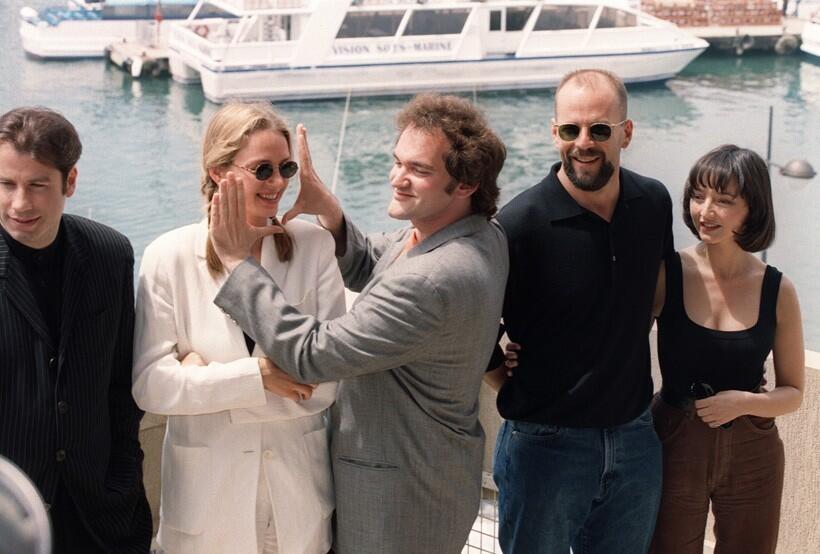 VeryOldPics's tweet photo. Quentin Tarantino and the cast of Pulp Fiction at the 1994 Cannes Film Festival http://t.co/HSYBfVNQpV