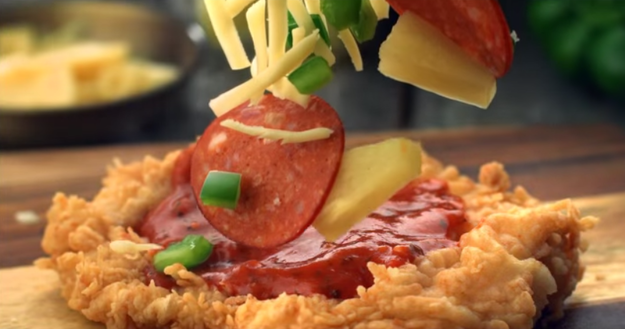 BuzzFeed's tweet photo. KFC just changed the game with the “Chizza,” a pizza with a fried chicken crust http://t.co/wvfH7RRwCR http://t.co/EltZCc5gPK