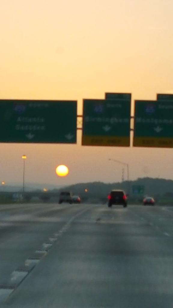 @spann now thats a sunrise! looks like those shots of the sun rising over the plains of Africa.  #hugesun
