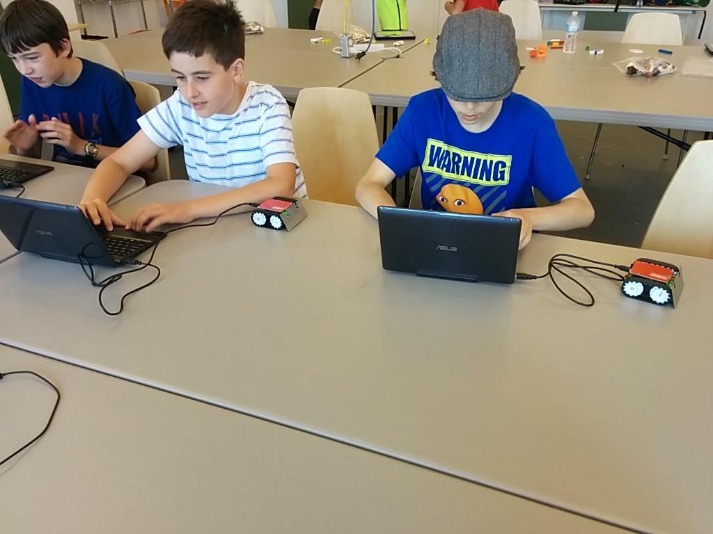 IcewireMake's tweet photo. Programming #Arduino zumo robots in summer camp! @LOGICSAcademy #robotics #makerspace http://t.co/BIk1Gb3qKd