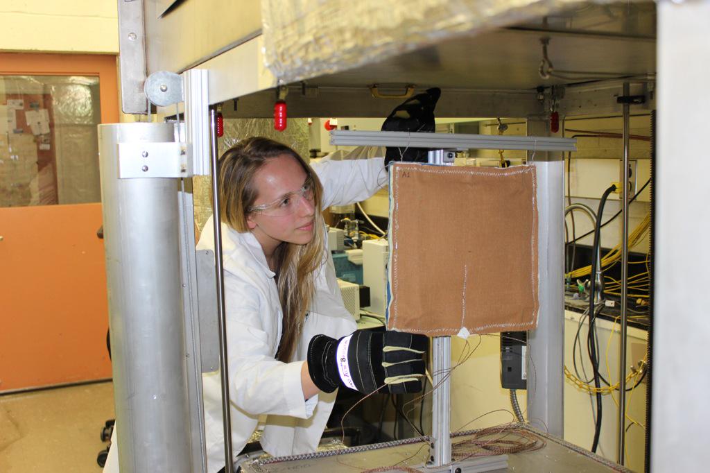 NISTPublicSafeT's tweet photo. SURF student from @UNHFireScience @UNH measuring the heat transfer rate through FF gear under controlled conditions http://t.co/HMeZMLThlu