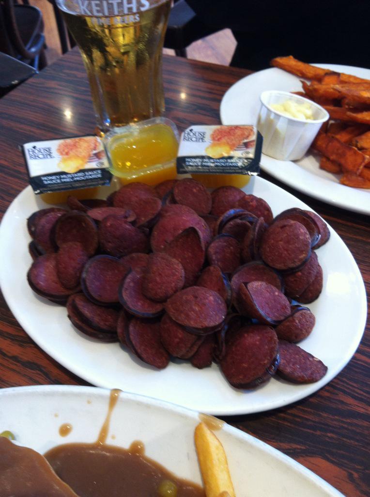 RickRalphNS's tweet photo. Hey @hustlerama look what I have! Midtown Tavern #Halifax #sociables. Same server since 1989. #deepfriedpepperoni http://t.co/aXTDyvGAJT