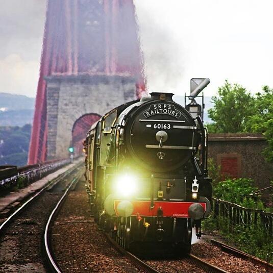#edinphoto of the Week is this magnificent shot by <a href="/PeterEdinPhoto/">Peter Stubbs</a> of the mighty Tornado crossing <a href="/theforthbridge/">The Forth Bridge</a>.