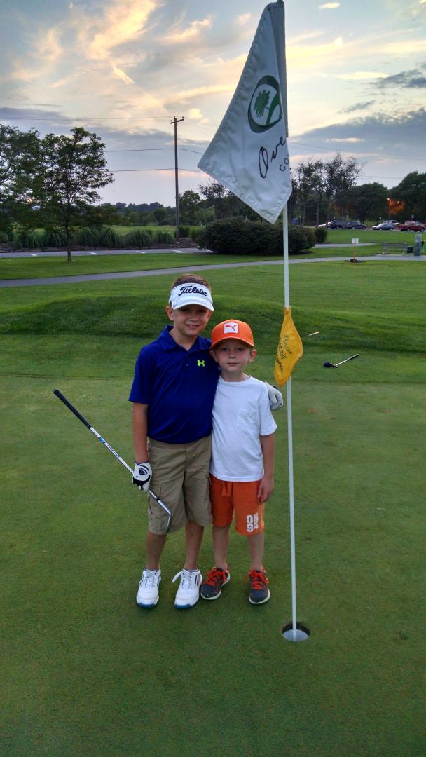 B_McGinty's tweet image. Joey and Miles practicing golf! Big brother Helping little brother! @OverlookGC