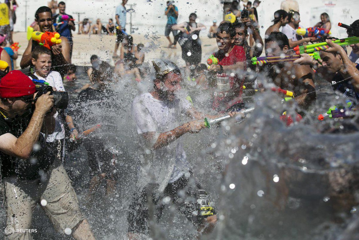 In photos annual water fight makes a splash in tel aviv