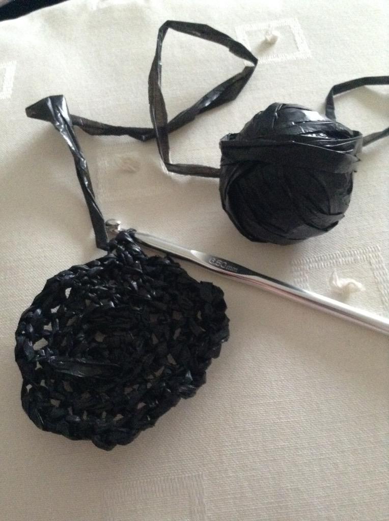 KatieMop97's tweet photo. Never thought I'd be crocheting a hanging basket lining out of a bin bag at any point in my life http://t.co/CwJfDl4ptd