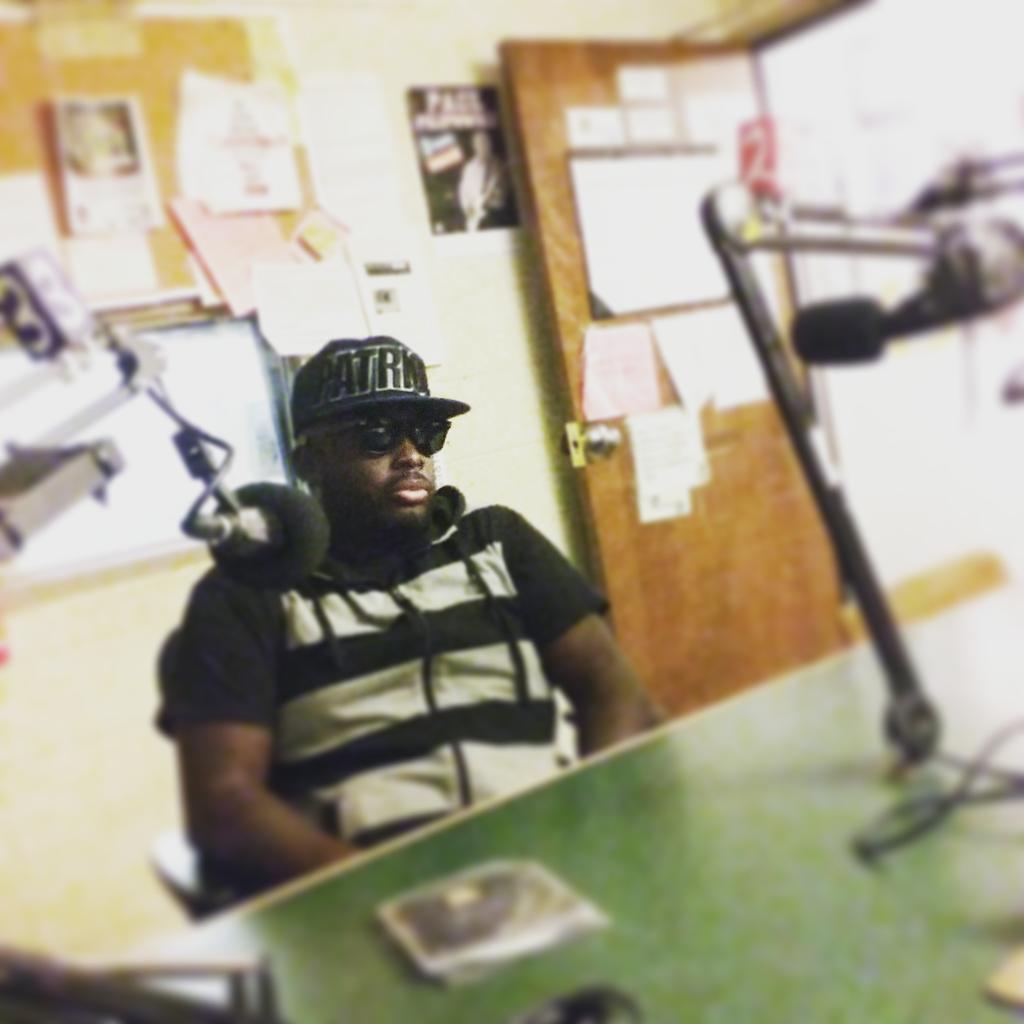 Flame The Ruler waiting to holla at the people on 89.9