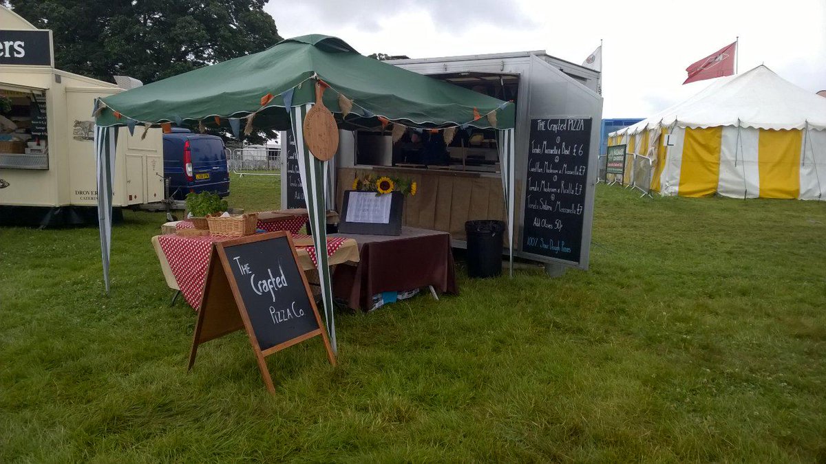 thecraftedpizza's tweet photo. It may be raining but #pizza is still on the menu #ashbyshow http://t.co/pCusgnp2EP