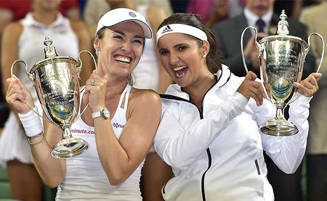 ndtv's tweet photo. President Pranab Mukherjee, PM Modi congratulate #SaniaMirza for Wimbledon triumph http://t.co/ha9uUGNpA8 http://t.co/iQXwyv8O7R