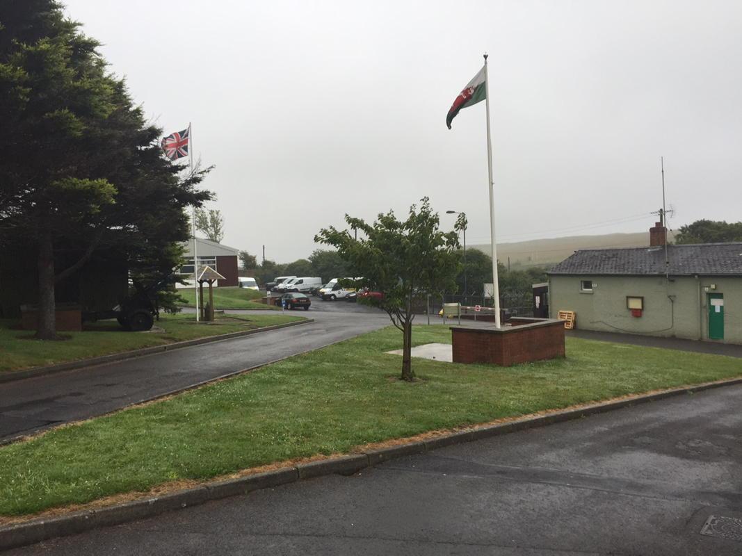 forestcc's tweet photo. A wet day for CCF camp. The flag shows the wind too... Summer in the South West. http://t.co/jl2rGMaAJC