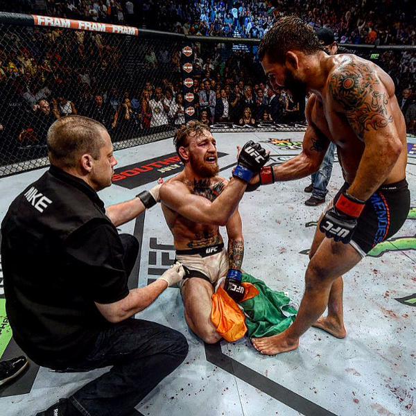 ODDSbible's tweet photo. The best picture from Conor McGregor's knockout victory over Chad Mendes last night. http://t.co/hsnouuoMpO
