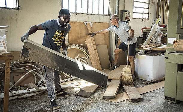 Telegraph's tweet photo. Migrants repay kindness in Italy by helping after freak tornado http://t.co/FpZCzJkV8Y http://t.co/xSvJPAVmRr