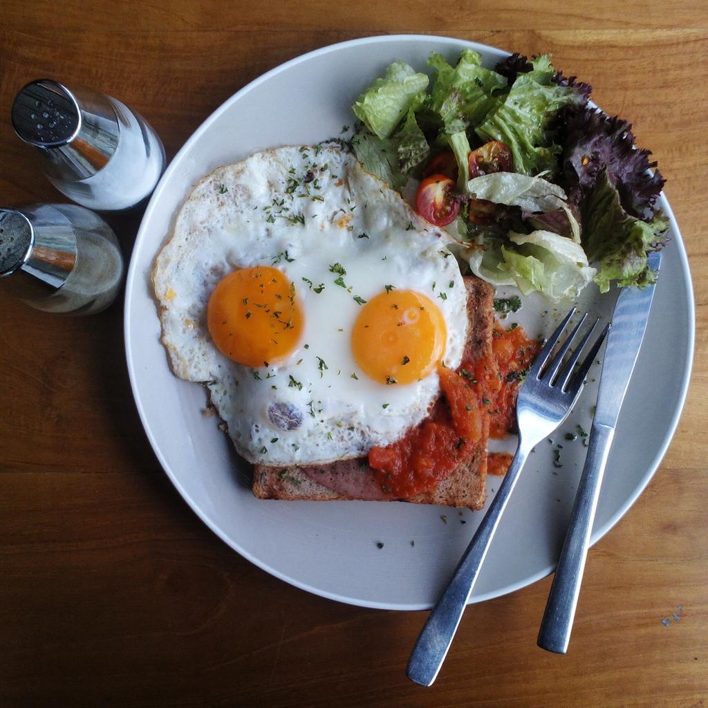 Look that gooey eggyolk on top of that bread, looks so nice right ? Yup...The double Decker Sandwich.