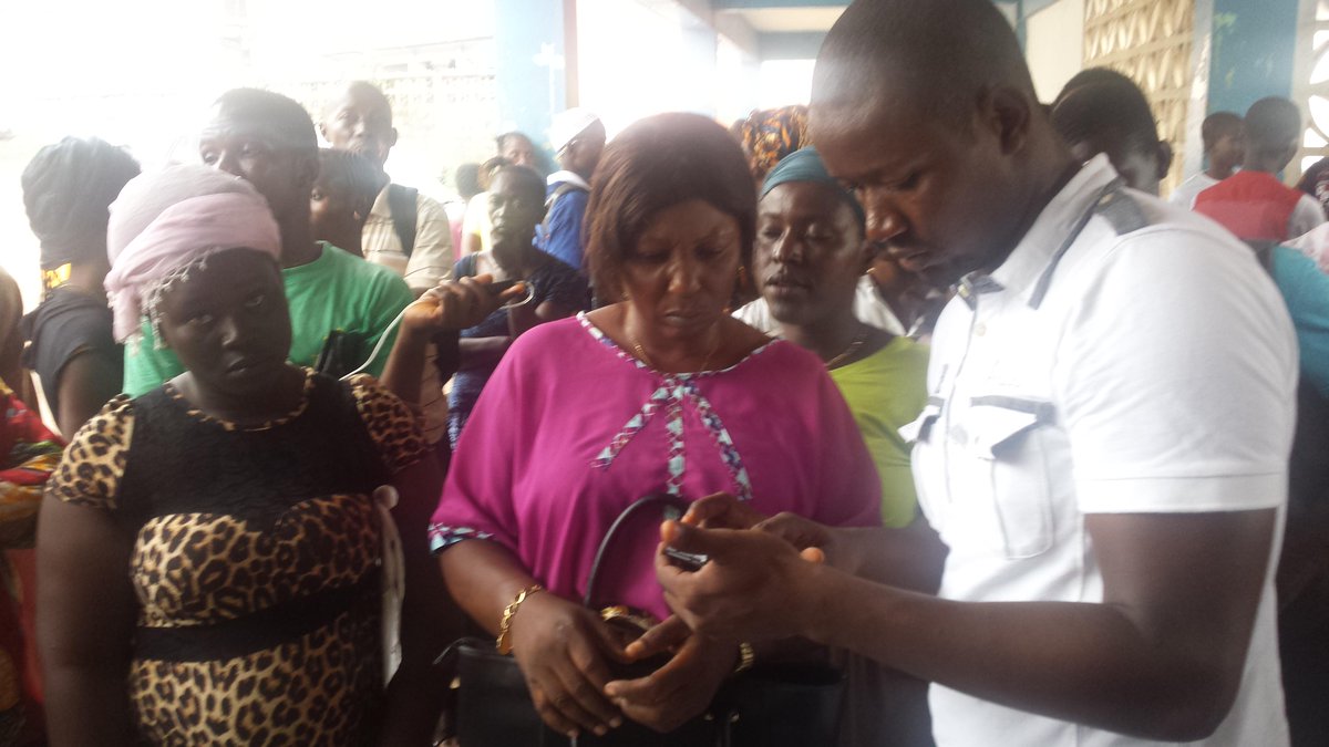 SierraLeone2003's tweet photo. Ebola Survivors in Sierra Leone start to receive cash transfer provided by WFP and Welthungerhilfe http://t.co/JMyy3TwM5S