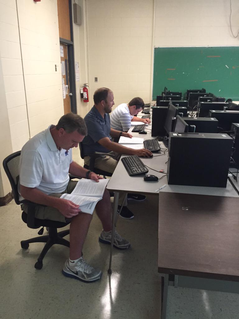 some of our great <a href="/TigersAthletics/">Memphis Tigers</a> coaches working hard on the recruiting test this morning @naacconnect