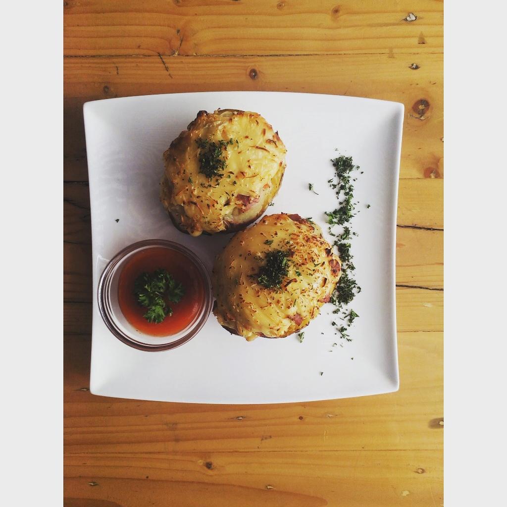 Not always human that wearing a jacket, like this potato we put some cheese jacket on top of those potatoes.