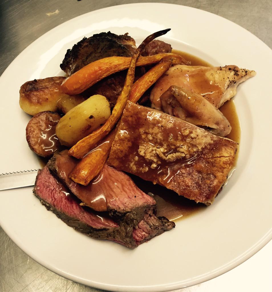 fabpubstansted's tweet photo. Chefs roast! All three meats of chicken, pork belly and beef with all the trimmings, topped with roasted carrots 👌 http://t.co/CkbyCyGftU