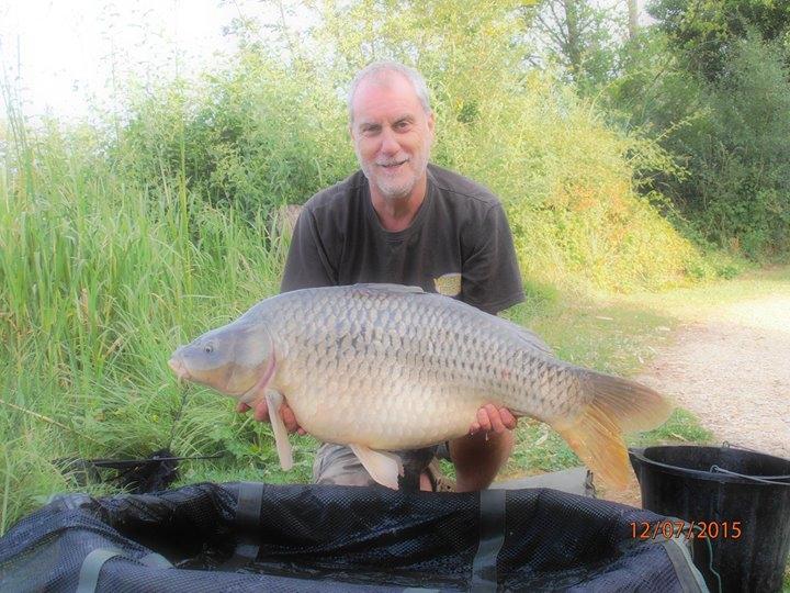 Barry Brunton with a 34lb common caught on a France trip. Coconut cream do the damage.