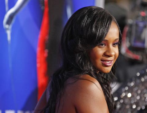 NBCNews's tweet photo. BREAKING: Bobbi Kristina Brown, daughter of Whitney Houston and Bobby Brown, dies at 22 http://t.co/YHZ8nVe7At http://t.co/5ZqnBTDvf7