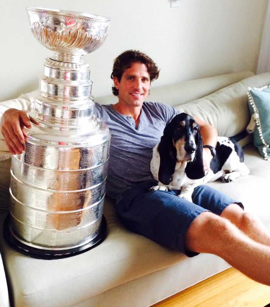 keeperofthecup's tweet photo. Patrick and his pal, Shooter. The end of a great day! (Niantic, CT) #StanleyCup @NHLBlackhawks @HockeyHallFame http://t.co/nRXeHYmBcF