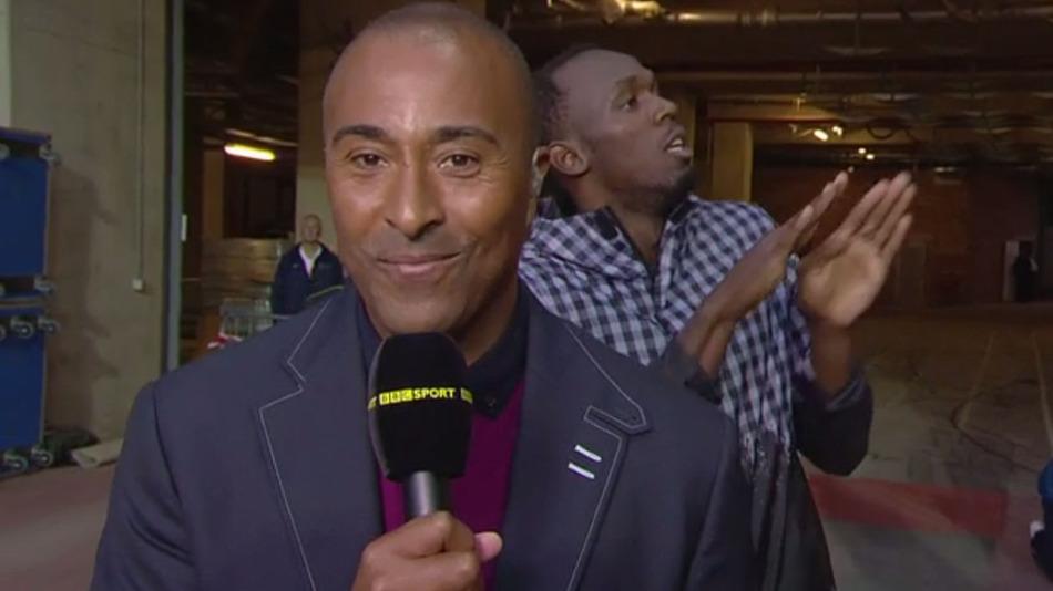 mashable's tweet image. Usain Bolt videobombs BBC presenter with stealthy dance moves on.mash.to/1SJp9aT