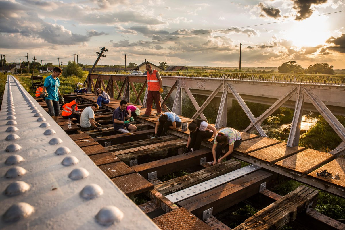 Mocanitaru's tweet photo. 15 volunteers were repairing the bridge last evening in Cornățel on the Sibiu-Agnita railway. Thank you all! http://t.co/tBZDRa8LGg