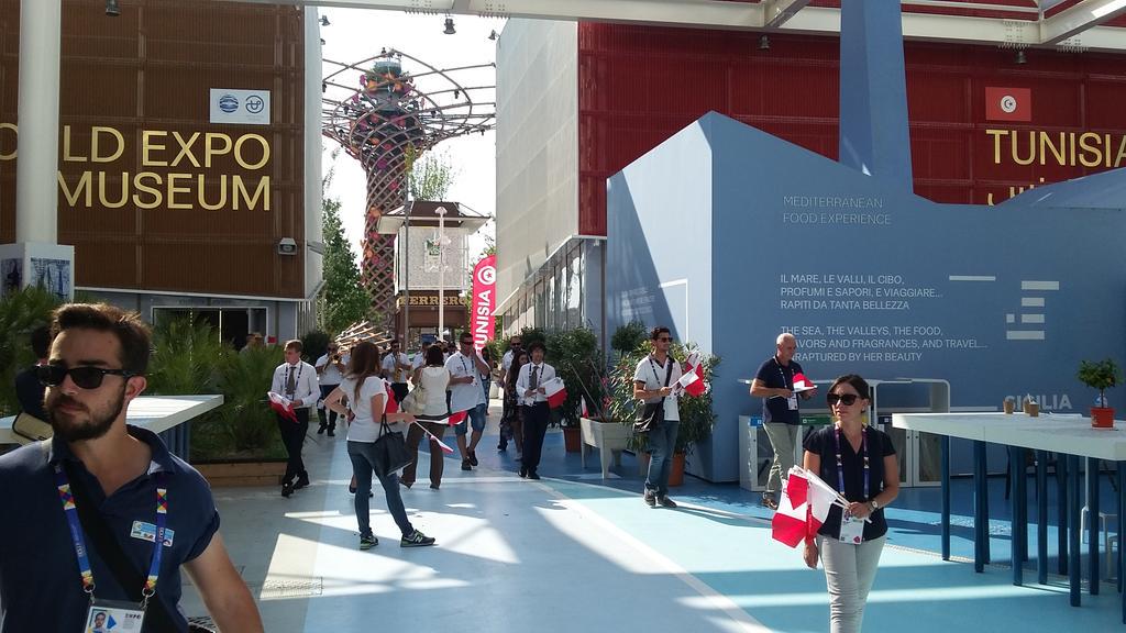 MaltaExpo2015's tweet photo. #bigbandbrothers parading into @ClusterBioMed on #MaltaDay before start of #cookingshow at #Expo2015 http://t.co/gH8xp2vM0v