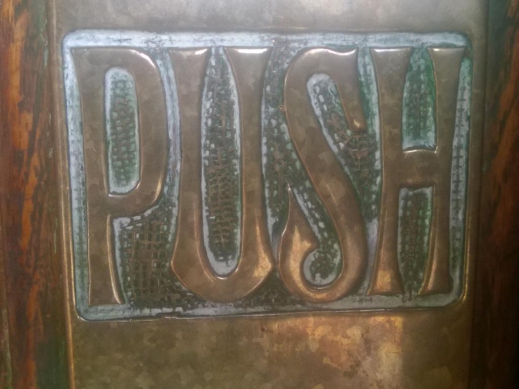 FontPicker's tweet photo. Checking out the door typography at @the_tetley in Leeds. http://t.co/f7ubJ950hf
