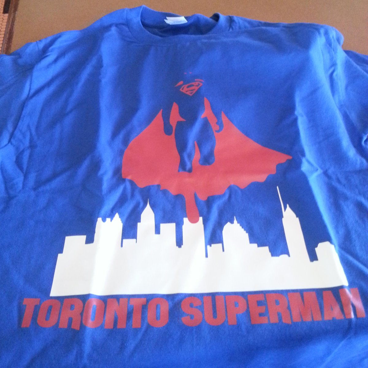 KelseysBrampton's tweet photo. Come take a selfie with the manager wearing either the batman or superman shirt and you could win it! #brampton http://t.co/2Dedo62AhH